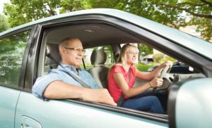 Parent instructing teen driver