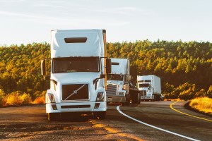 trucks speeding along highway